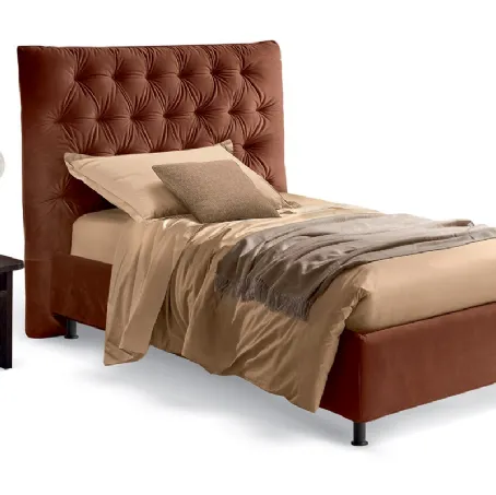 Letto singolo classico rivisitato in chiave moderna con testiera decorata con imbottitura capitonnè Artemide di Rosini Night